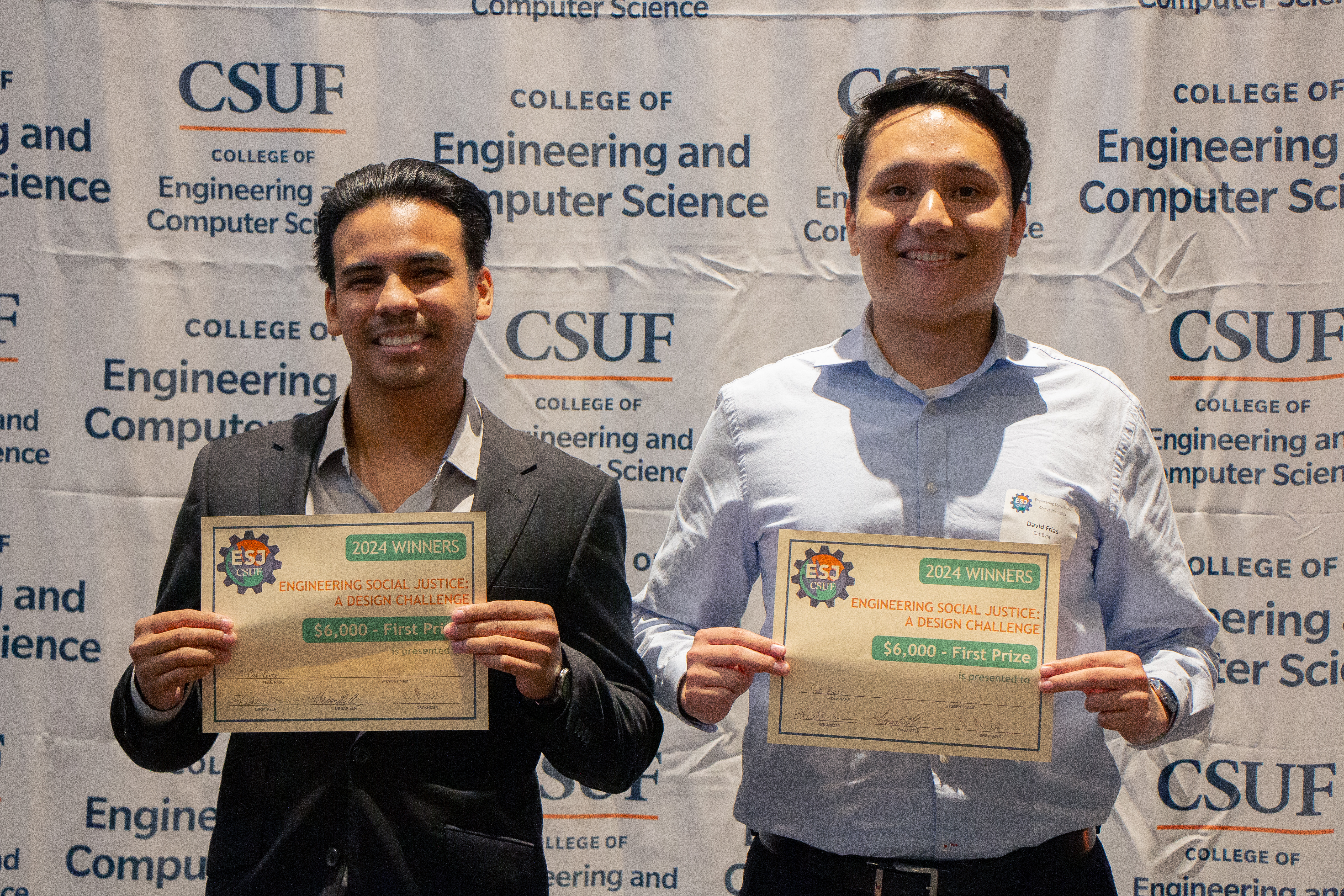 Cat Byte Team holding up their award!