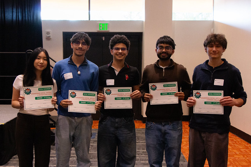 1st place winners holding up their award!