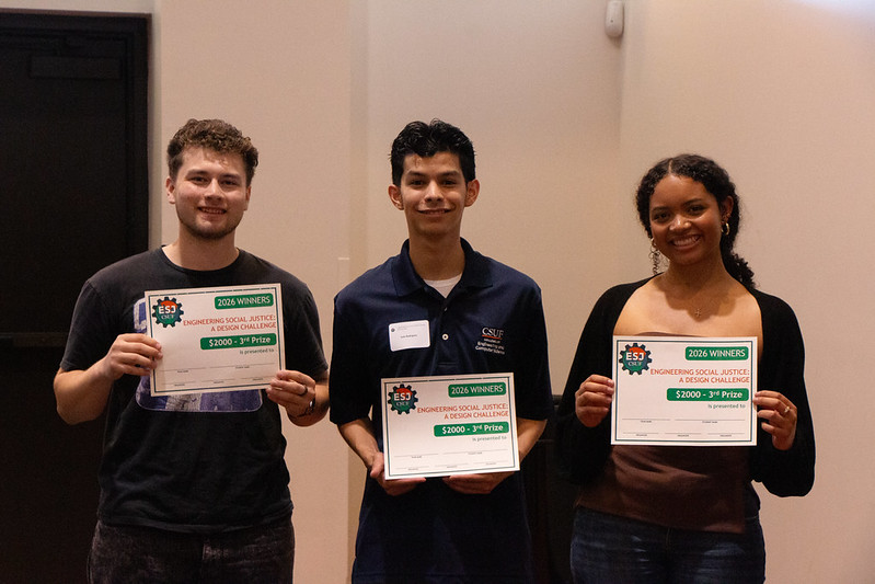 3rd place winners holding up their award!