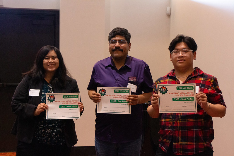 Best poster winners holding up their award!