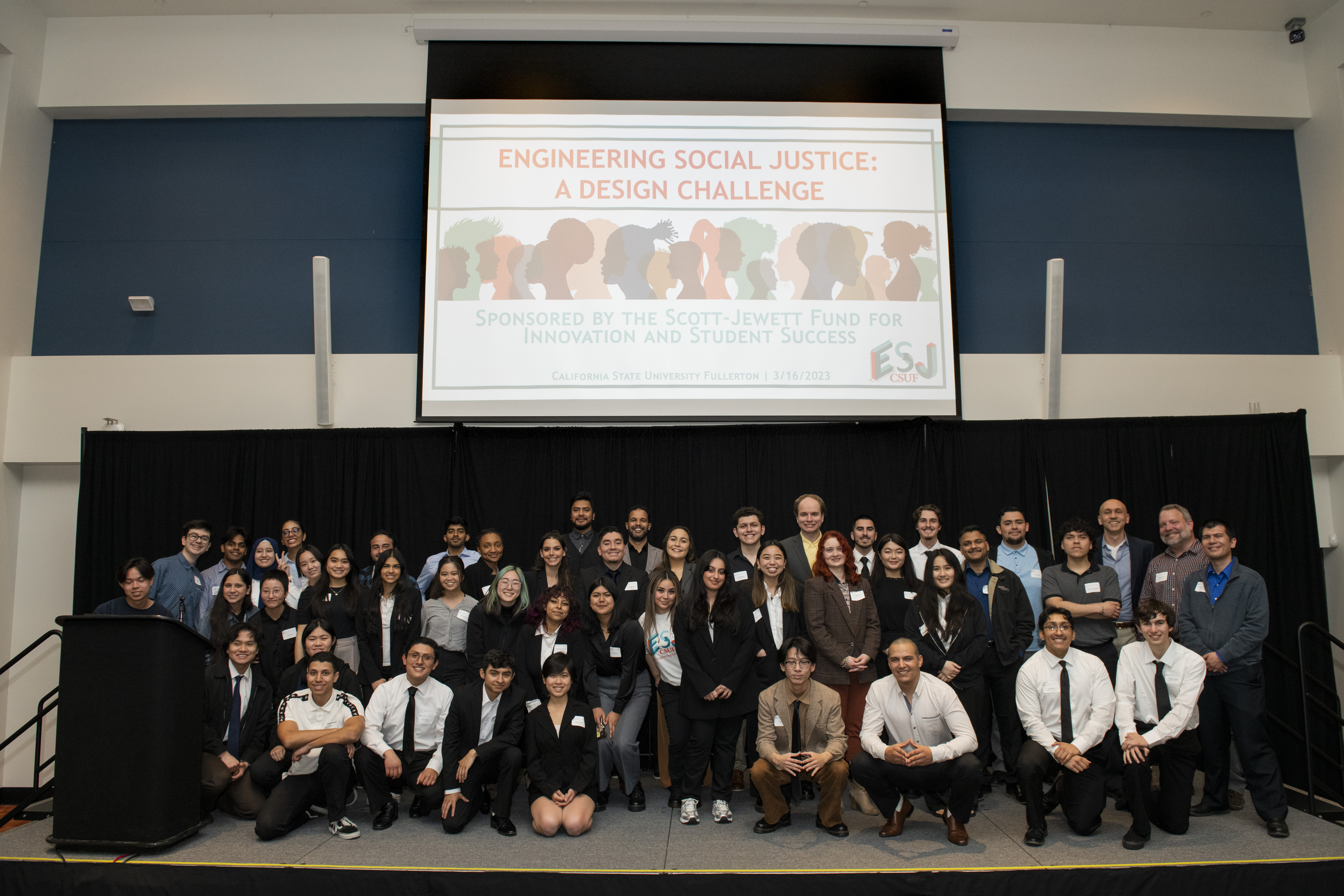 ESJ 2023 Participants gathered onstage for a group photo.